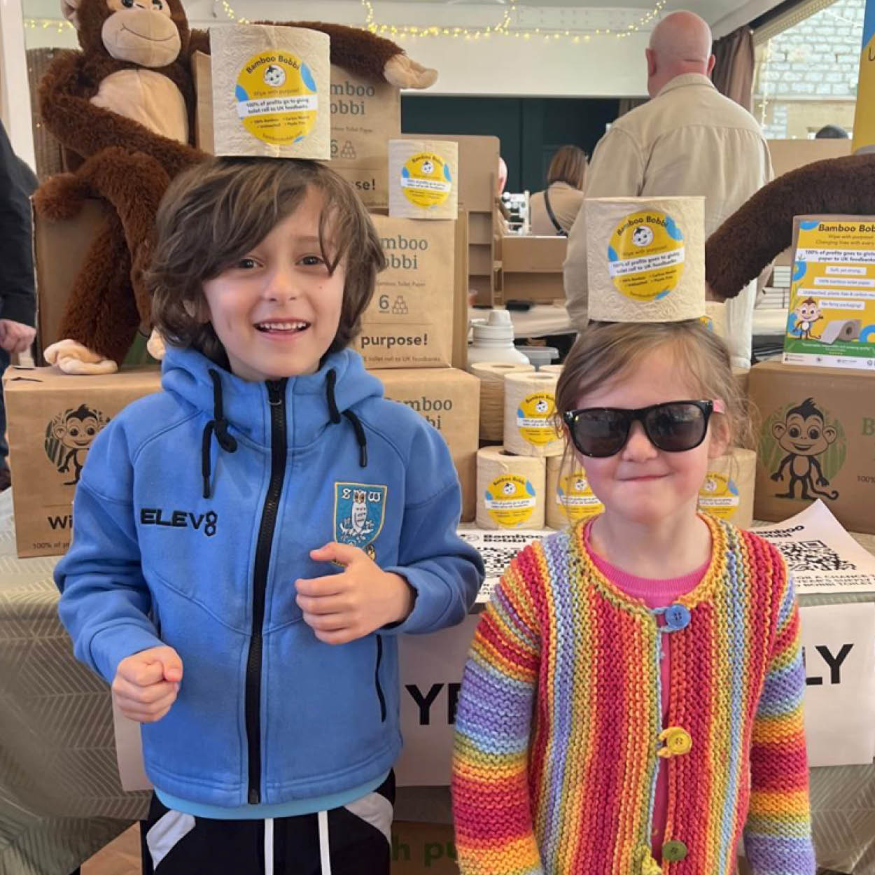 Children with Bamboo Bobbi toilet paper on their head